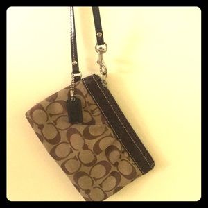 Adorable and classic coach wristlet